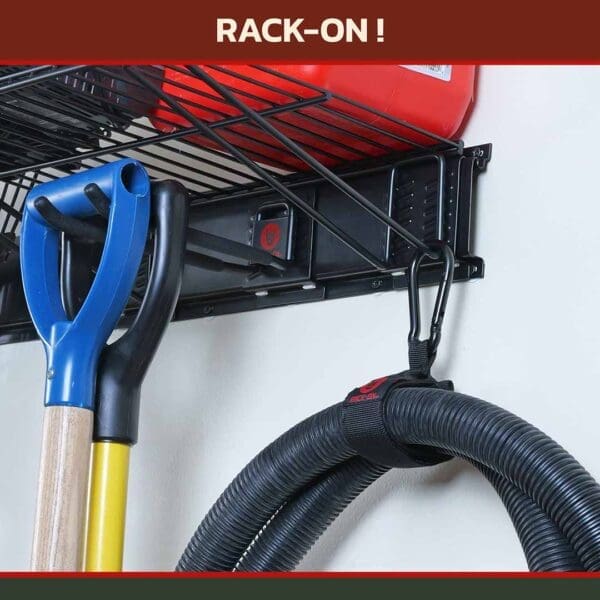 Rack-On_store-images_ACC103-Vac close-up of RACK-ON Ripper Connector wrapped around a vaccuum hose and hanging from a Revelation rack wall-mount tool organizer.